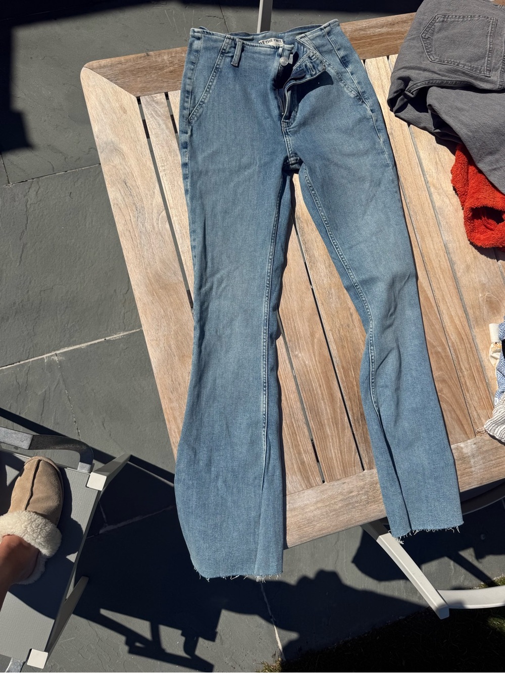 Never worn- Free people High-Waist flare Light Blue Women's Jeans with Raw Hem